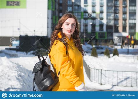 Beautiful And Stylish Russian Girl Model In Winter On The Street Of