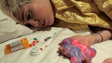 Pill Popping Miley Cyrus Trips Out In NSFW Flaming Lips Video