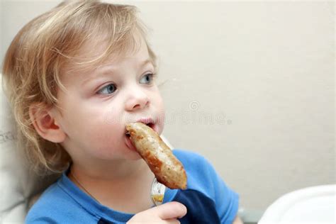 Kid Eating Sausage On Skewer In Forest Stock Photo Image Of Meal