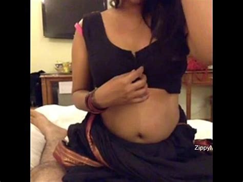 Hot Desi Bhabhi Showing Big Boobs N Putting In Condom On