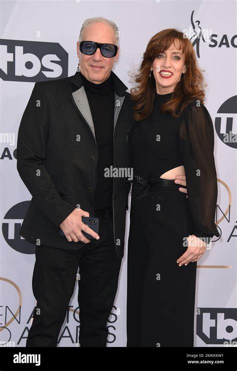 Andrew Dice Clay Left And Eleanor Kerrigan Arrive At The 25th Annual Screen Actors Guild