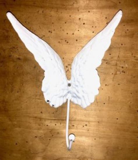 cast iron angel wings wall decor white purse hook for wall etsy