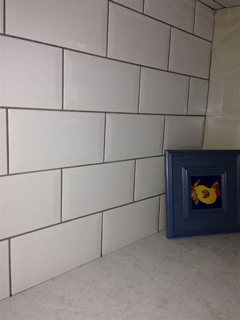 Tile guy thinks white grout will not look good with my very light taupy/grey tile. llaga gris | Industrial kitchen, Vintage industrial ...