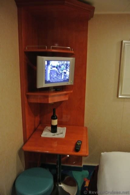 Small Flat Screen Tv And Small Desk In Corner Of Norwegian Gem Inside Cabin Hi Res 1080p Hd