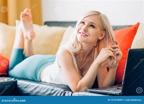 Babe Woman Using Laptop While Relaxing On Sofa Stock Image Image Of Couch Happy
