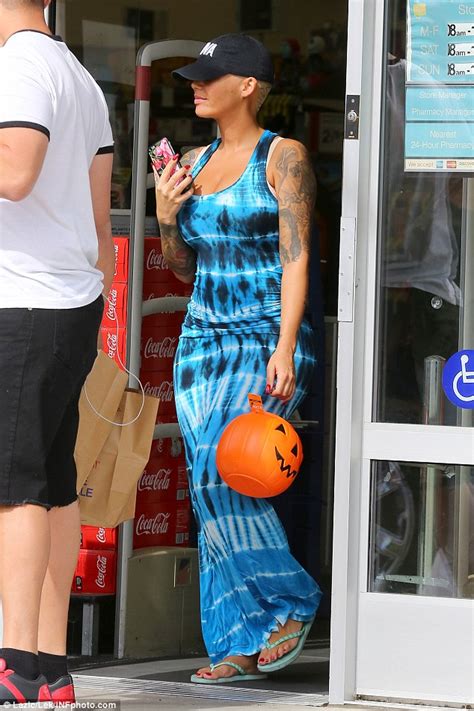 amber rose highlights her curves in clingy maxi dress in los angeles daily mail online
