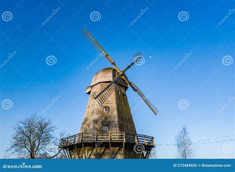 Windmill With Blue Sky With Moon In Background Stock Photo Image Of
