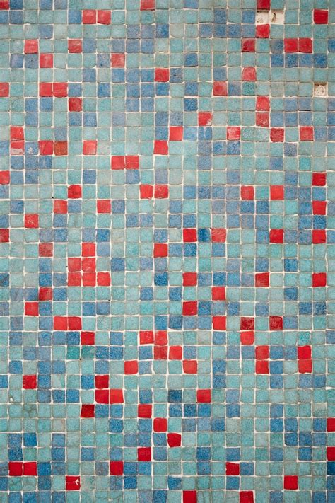 A Blue And Red Tiled Wall With Red And Blue Tiles Photo Wall