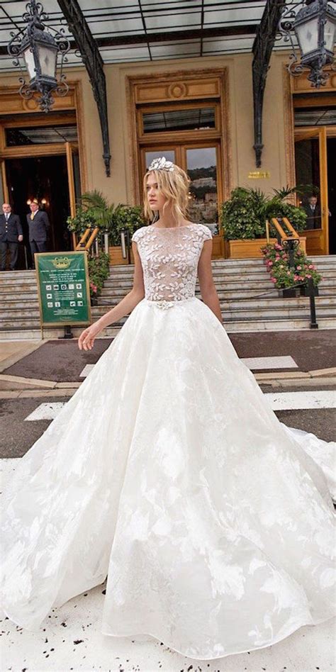 The dress has a large train which is beautifully decorated with lace and bead work. Sexy Wedding Dresses for the Modern Bride: Timeless and ...
