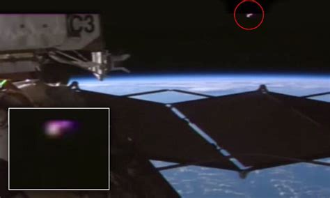 conspiracy theorists spot yet another ufo hovering above iss daily mail online