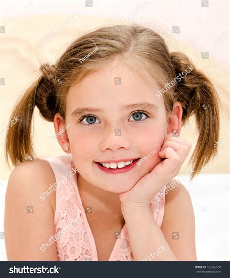 Adorable Smiling Little Girl Resting On Stock Photo 657386500
