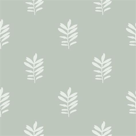 Simple Minimalist Seamless Pattern With Leaves On Pastel Green