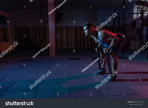 Muscular Powerful Man Naked Torso Trains Stock Photo
