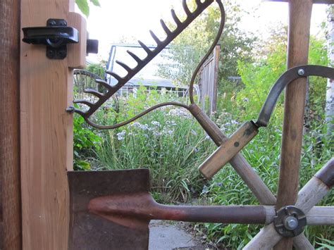 Old Tools Repurposed Into A Funky Gate Garden Tool