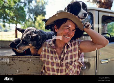 Farmer And Her Dogs Australia Stock Photo Alamy