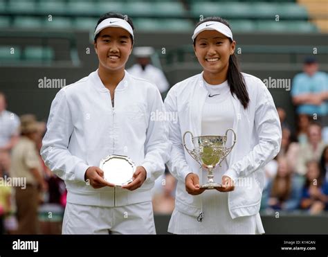 Claire Liu And Ann Li Celebrate With Their Trophies At The Girls