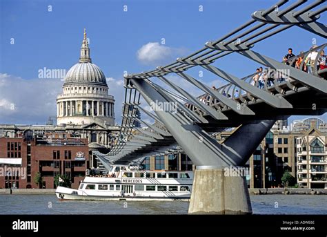 St Pauls Cathedral Contrasts With The New Millennium Bridge In London