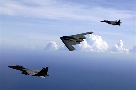 Usaf Photo Of The Weekend B 2 Spirit And F 15e Strike Eagles Over The Pacific Ocean Near Guam Usa