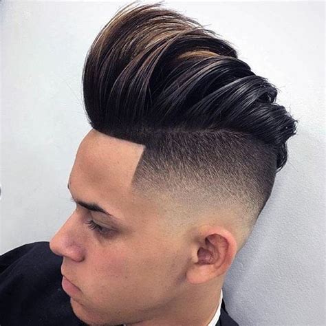 Fade haircuts and hairstyles have been very popular among men for many years, and this trend will likely carry over into 2021 and beyond. Top 50 Comb Over Fade Haircuts for Guys (2020 Hot Picks} (With images) | Fade haircut, Comb over ...