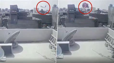 world news pia plane crash video cctv footage shows flight pk 8303 crashing into karachi