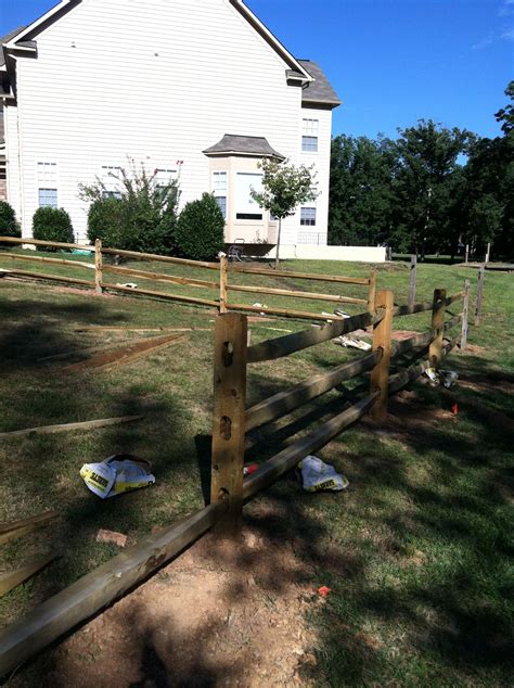 The caps on the poles accent the elegance of the fence. Split Rail Fencing, Eco Guys Mowing & Landscape ...