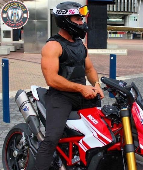 A Photograph Showing A Muscular Bodybuilder Biker Wearing The Icon