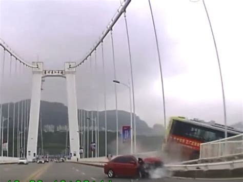 Video From China Shows Bus Plunging Off Bridge Into River After Passenger Driver Fight Cbs News