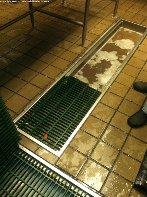 Wet room drainage shower systems. Cleaning floor drains - image