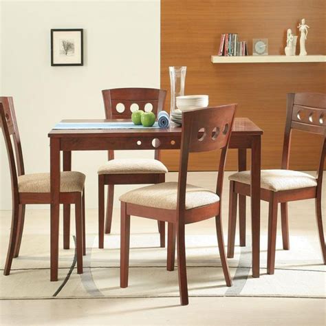 Our dining ensembles are built with quality solid hardwoods including indian rosewood, mango wood, and premium reclaimed wood. Buy Lyon Solid Wood 4 Seater Dining Table Set Online | Buy ...