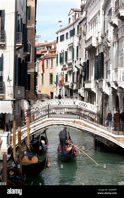 A Bustling Scene With Gondolas Pictured On The Grand Canal Venice Italy Stock Photo Alamy