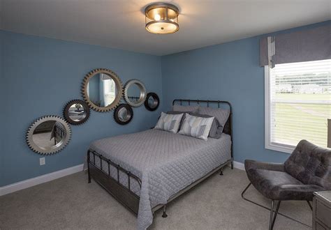 View our entire collection and place an order with delivery and installation here. Guest bedroom with blue wall paint and beige carpet ...