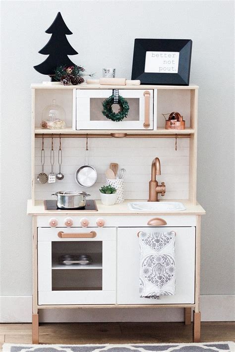 Use a pencil to mark the outside edge, where you'll be cutting, and also mark all along the inside of the cabinet. Sycamore Bluff | IKEA DUKTIG DIY Play Kitchen Re-D #Bluff ...