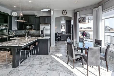 Gray marble countertop in a black and white kitchen. Beautiful Black Kitchen Cabinets (Design Ideas ...