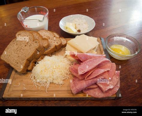 ingredients and making of a croque monsieur french ham and cheese sandwich toasted meal