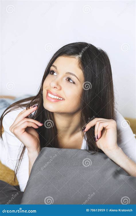 Relaxing Woman Sitting Comfortable In Sofa Lounge Chair Smiling Happy