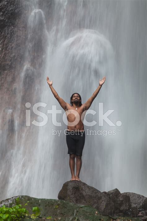Man At Waterfall Stock Photo Royalty Free Freeimages