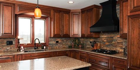 The one that i've found that works. cherry cabinets and stone backsplash | Kitchen | Pinterest ...