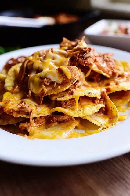 To make this recipe, you will need ground beef, garlic, onion, and taco seasoning. Easy, Cheesy Chicken Nachos for the Big Game | Recipe ...