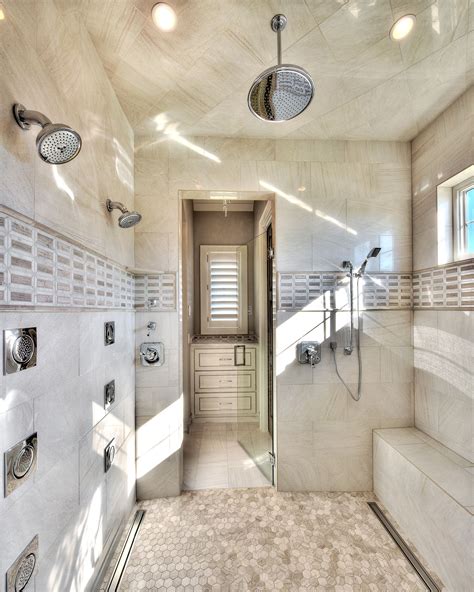 master shower shower bench multiple shower heads stone floor starrhomes bathroom layouts