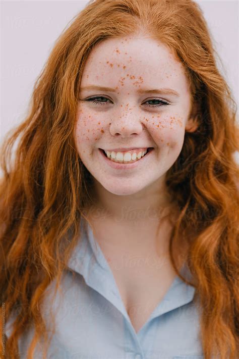 A Smiling Scottish Teenager With Ginger Hair And Freckles By Maresa Smith