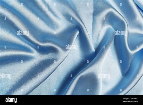 Blue Crepe Satin Crumpled Or Wavy Fabric Texture Background Abstract
