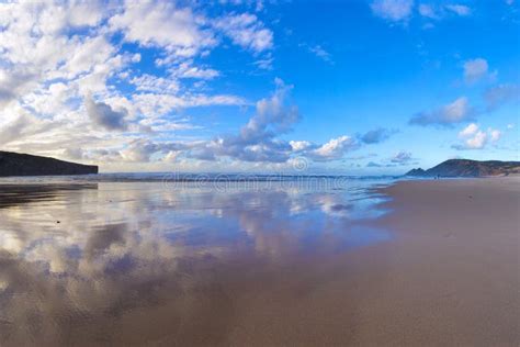 Beautiful Scene Cloudy Blue Sky Reflected On Beach Wet Sand Stock Image