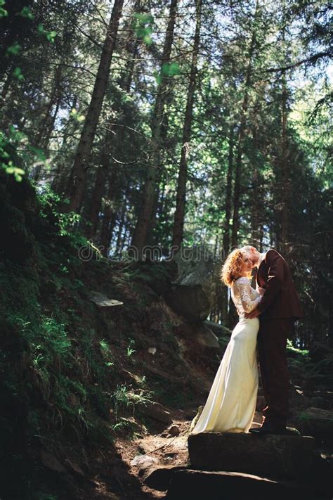 Happy Stylish Couple Newlyweds In The Green Forest On Summer Day Bride