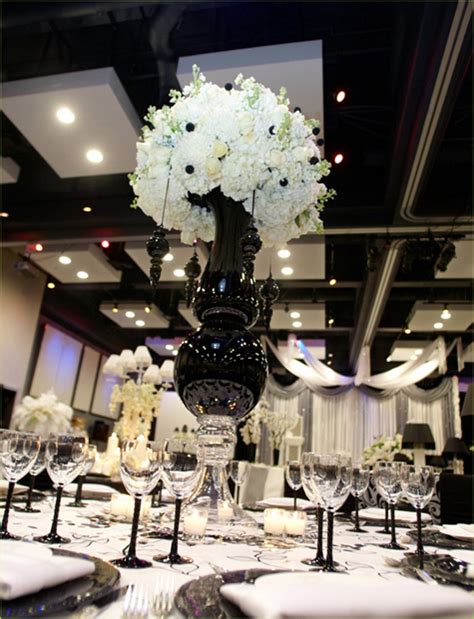 By sticking to a simple color combination, additional colors or unique accents stand out with style. Black and White Wedding Theme - Arabia Weddings