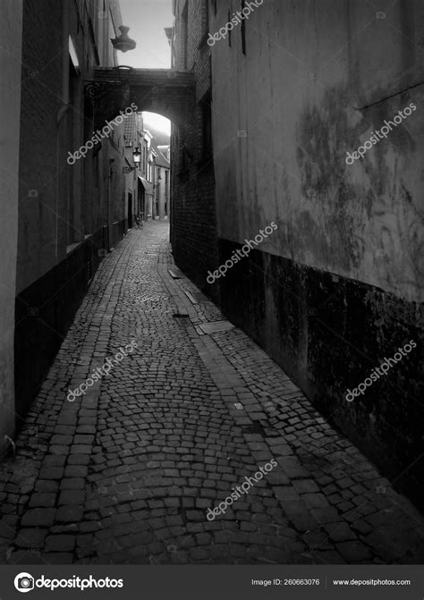 Narrow Dark Alleyway Stock Photo By ©yayimages 260663076