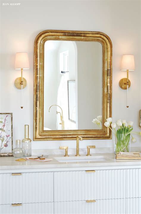 Notify me when this product is available this antique gold metal mirror on a burnished gold metal stand can also be hung would be perfect for placing on a dressing table or on a bathroom shelf. Bathed in Beauty | Bathroom light fixtures, Gold mirror ...