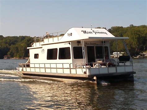With a twisted shoreline dotted with sandy beaches and towering evergreens, pickett county's dale hollow lake has long been a favorite destination for fans of houseboat vacations in northern tennessee. Dale Hollow Lake Houseboats For Sale - DHLViews
