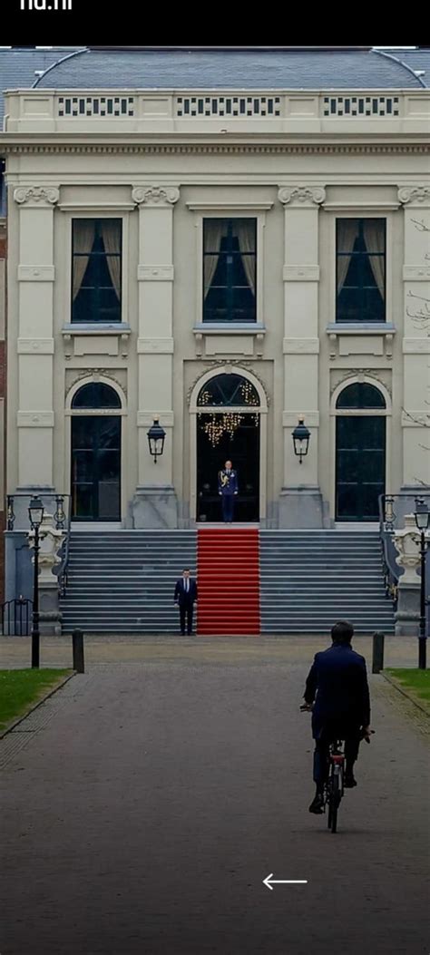 Dutch Prime Minister Mark Rutte On His Bike Going To The King To Hand