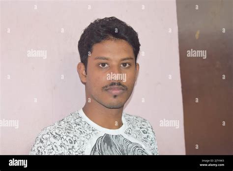 An Indian Man Posing For Photo At Home Stock Photo Alamy