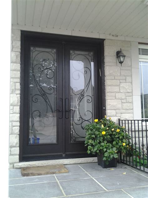 Double Fiberglass Door System With Serafina Wrought Iron Design In